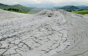 Mud volcano erupting with dirt